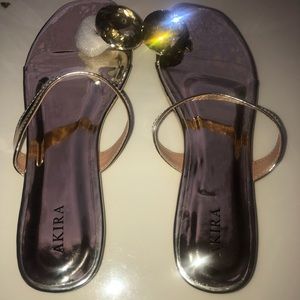 Beautiful Gold sandals with oversized toe gems